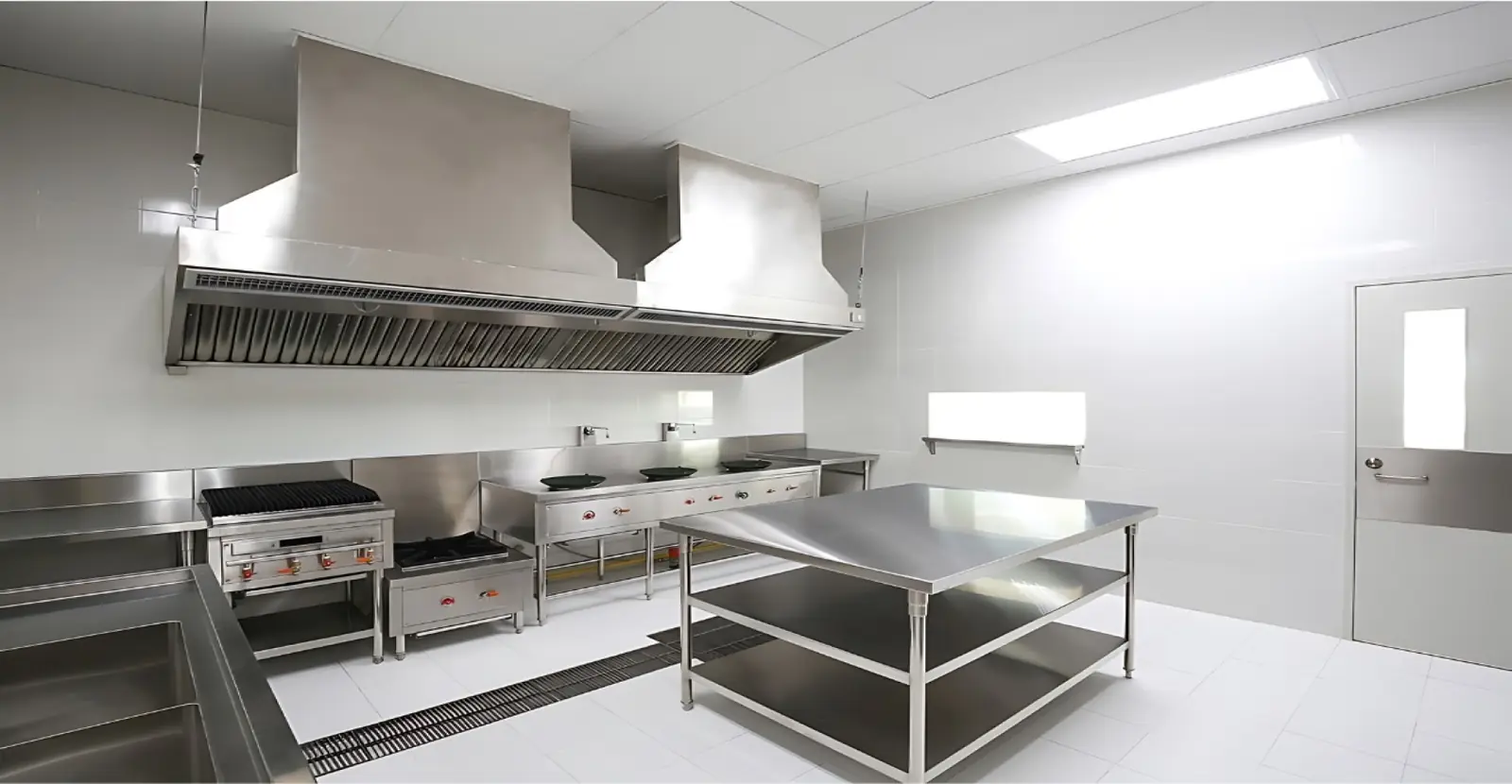 Commercial kitchen with stainless steel equipment